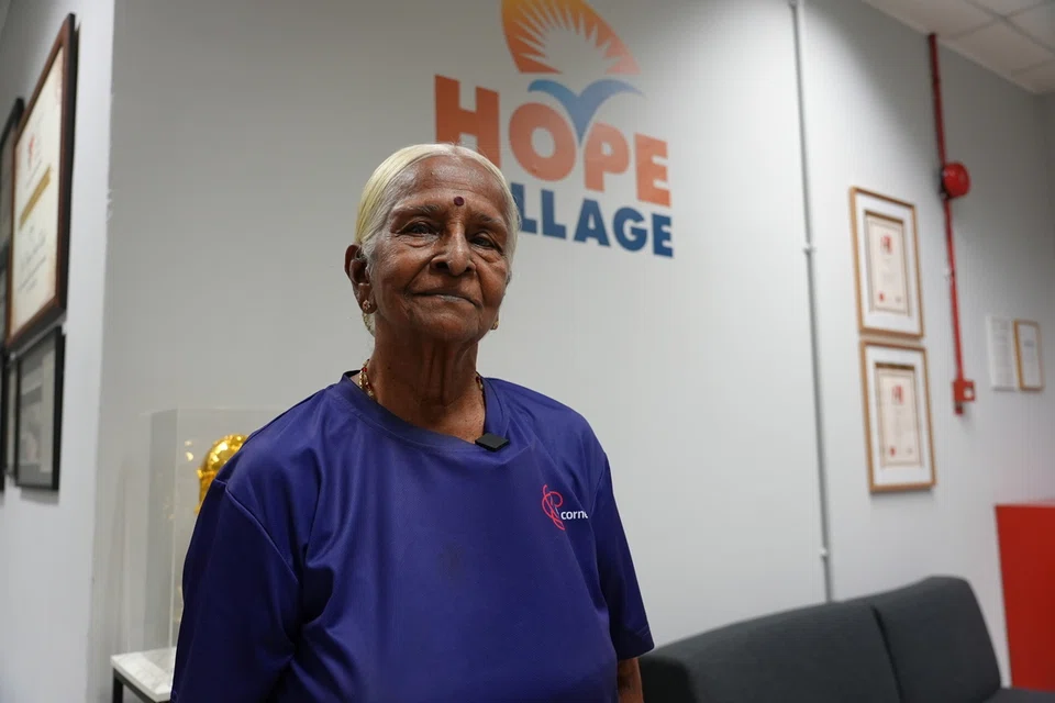 Senior volunteer Mdm Ratnam Periowsamy, 90, was the oldest participant among the 120 elderly volunteers who hosted and served migrant workers at the event.