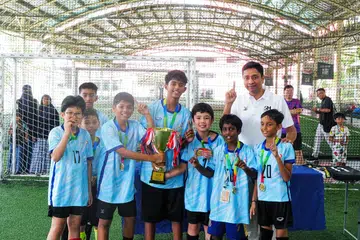 The winners with Minister of State Dinesh Vasu Dash.