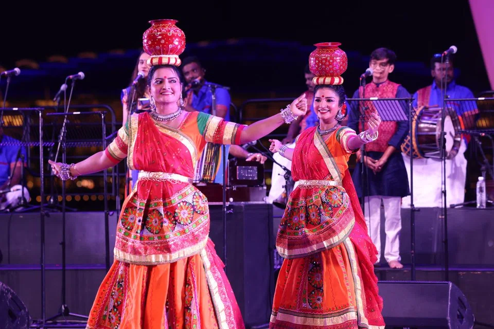 Artistes performing Garba, a Gujarati folkdance.
