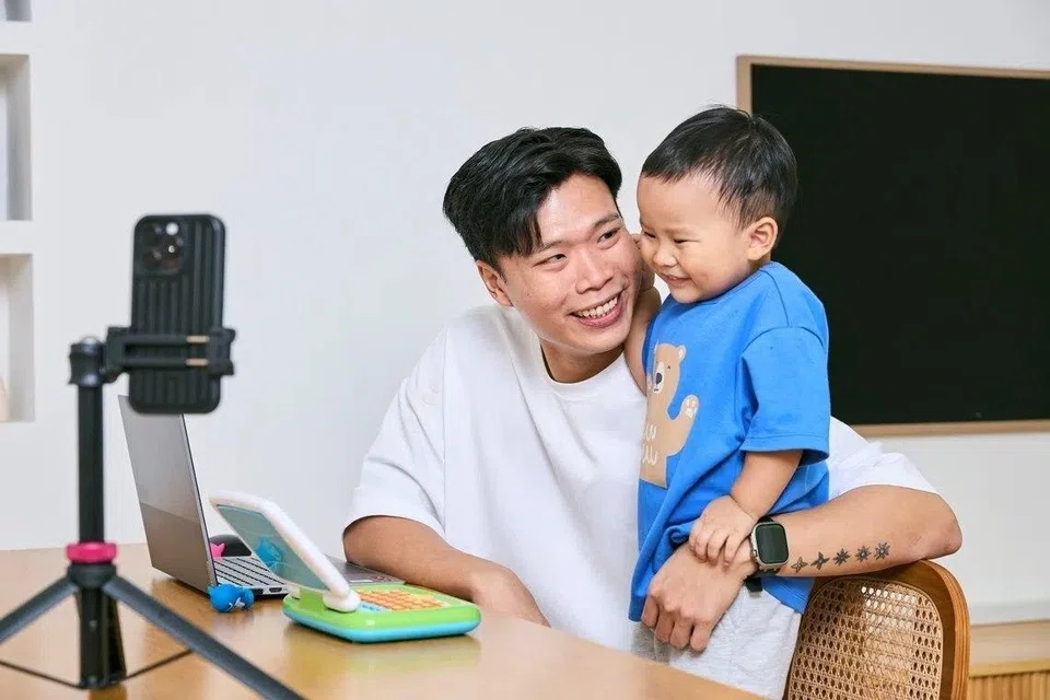 Benjamin makes videos for social media with his three-year-old son Teddy.