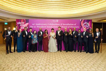 President Sonali Sinha (in maroon saree) with guest of honour Minister Indranee Rajah (centre) and the newly inducted board of directors.