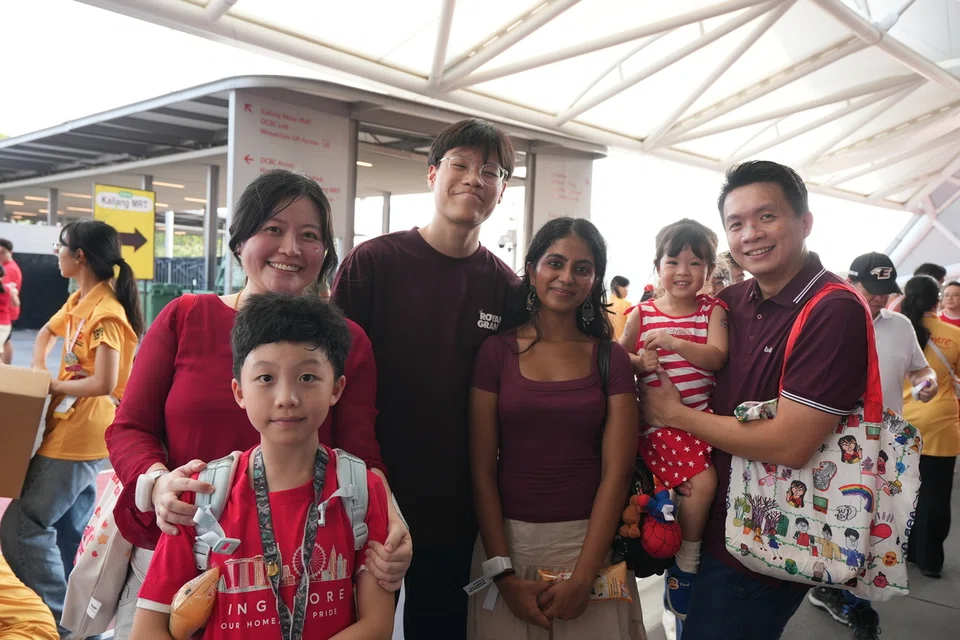Jahnavi Rao (centre) and her boyfriend Liang Rong Lim (left) attended NDP 2026 with his sister’s family.