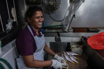 Madam Harikrishnan Uma works as a fishmonger at Tekka market.