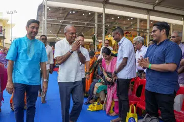 Coordinating Minister for National Security and Minister for Home Affairs K Shanmugam with Minister of State for Culture, Community and Youth, and Manpower Dinesh Vasu Dash at the Consecration Ceremony of Sree Maha Mariamman Temple on June 18, 2026.