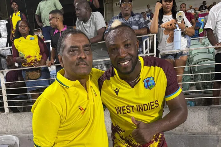 Dr Akshai Mansingh (left) with West Indies cricketer Andre Russell. 