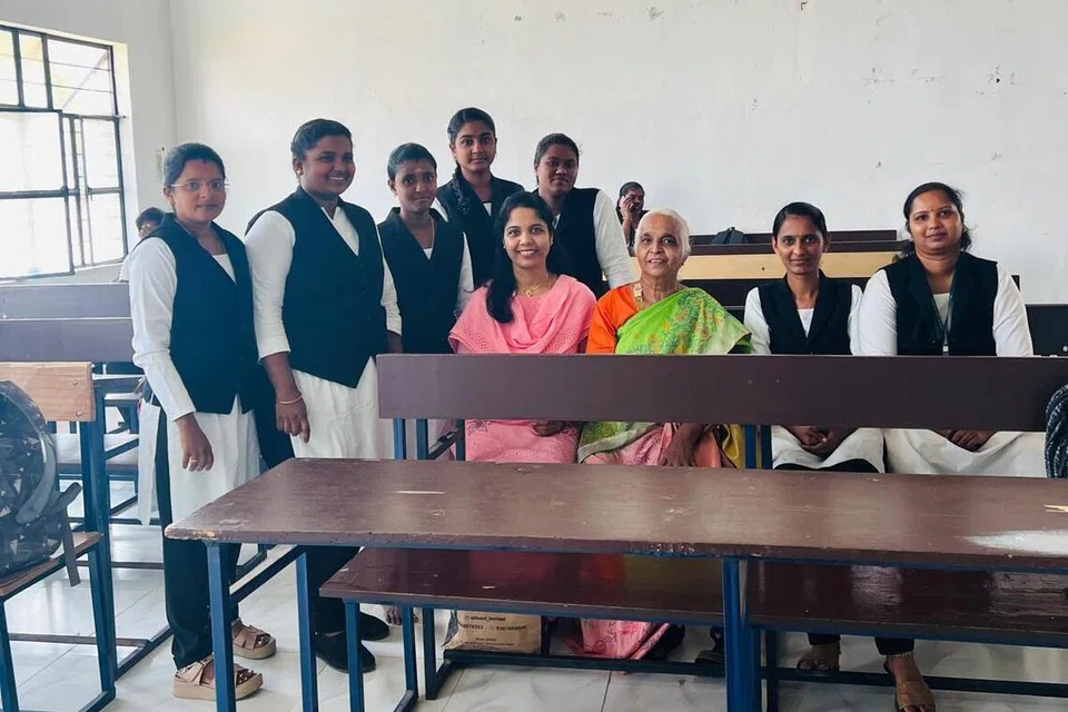 Mrs Thayammal with her daughter, Ms Sheela, and fellow classmates.