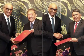 Sitoh Yih Pin (second from left) and Patrick Daniel (right) receiving their letters of credence from President Tharman Shanmugaratnam.
