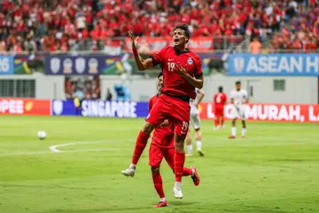 Lions forward Ilhan Fandi celebrating after scoring goal