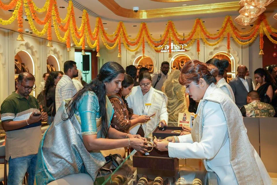 Invited guests taking a look at the collections on offer at the launch event of Bhima Jewellers’ first store in Little India, Singapore.