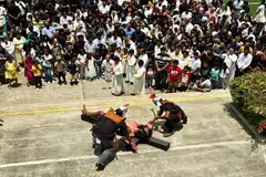 A live reenactment of the Way of the Cross on Good Friday at Holy Innocent’s High School.