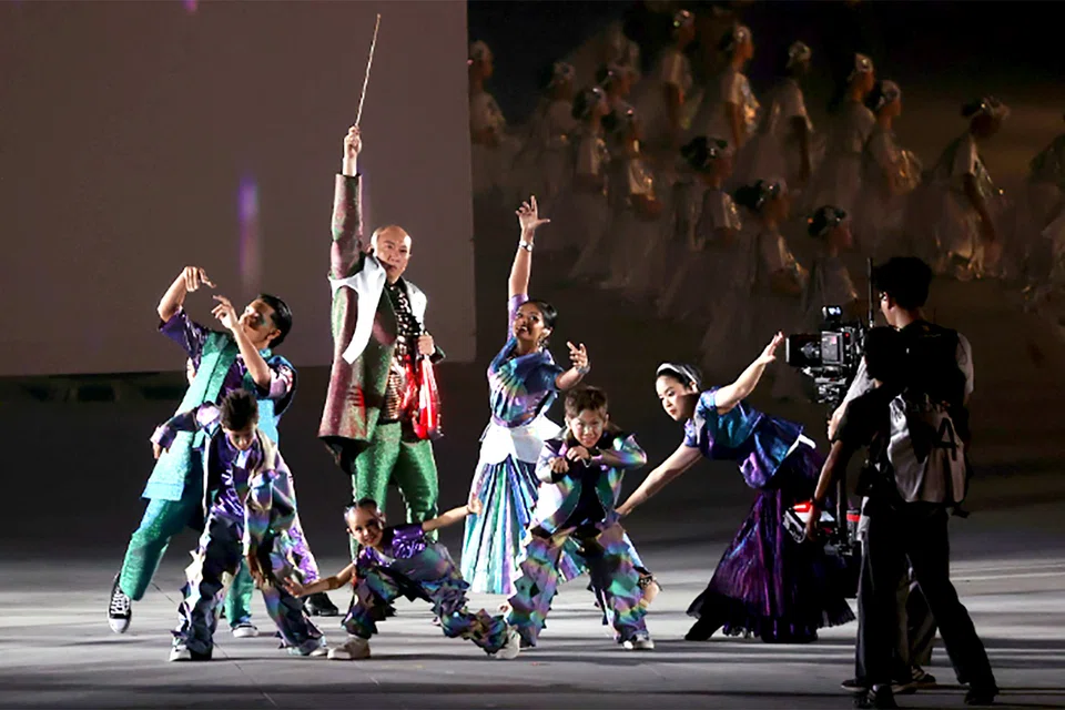 Musician Han Oh performing Zero G-Roll featuring seven dancers ranging from the ages of 8 to 29 spanning all four races, and championing neurodiversity with an autistic dancer and a dancer with Down Syndrome, during Chapter 5 of National Day Parade Preview 2 at the National Stadium on Aug 1, 2026.