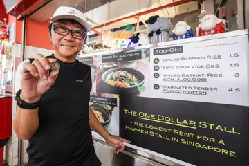 Mr Ng Khai Choon, who runs Kook@Chinatown, a hawker stall in Smith Street specialising in mutton soup. He pays a monthly rent of just $1 for the stall.