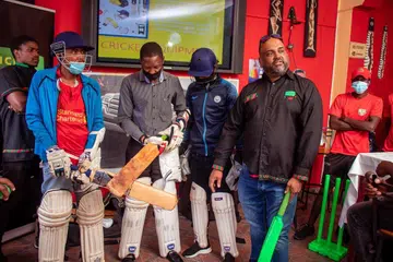 Former national cricketer and coach Arjun Menon (left) conducting a cricket awareness course in Malawi on May 5, 2021. Those wishing to support the initiative can donate via give.asia/arjun-menon-legacy.