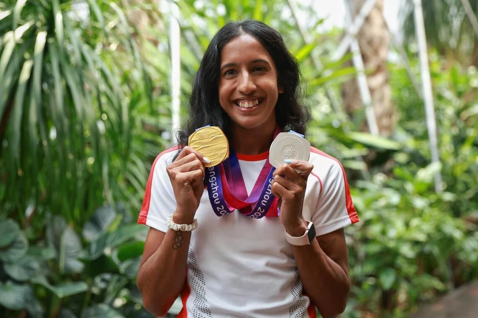 Shanti Pereira with her Asian Games gold and silver medals Oct 5.