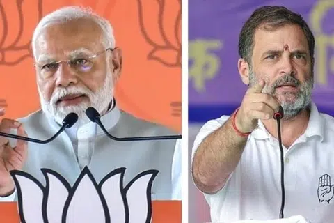 நரேந்திர மோடி, ராகுல் காந்தி.