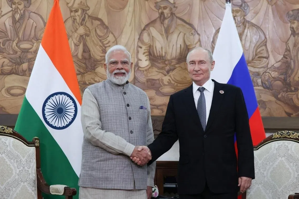 அமைதியை நோக்கி நகர வேண்டும்: புட்டினிடம் மோடி வலியுறுத்து