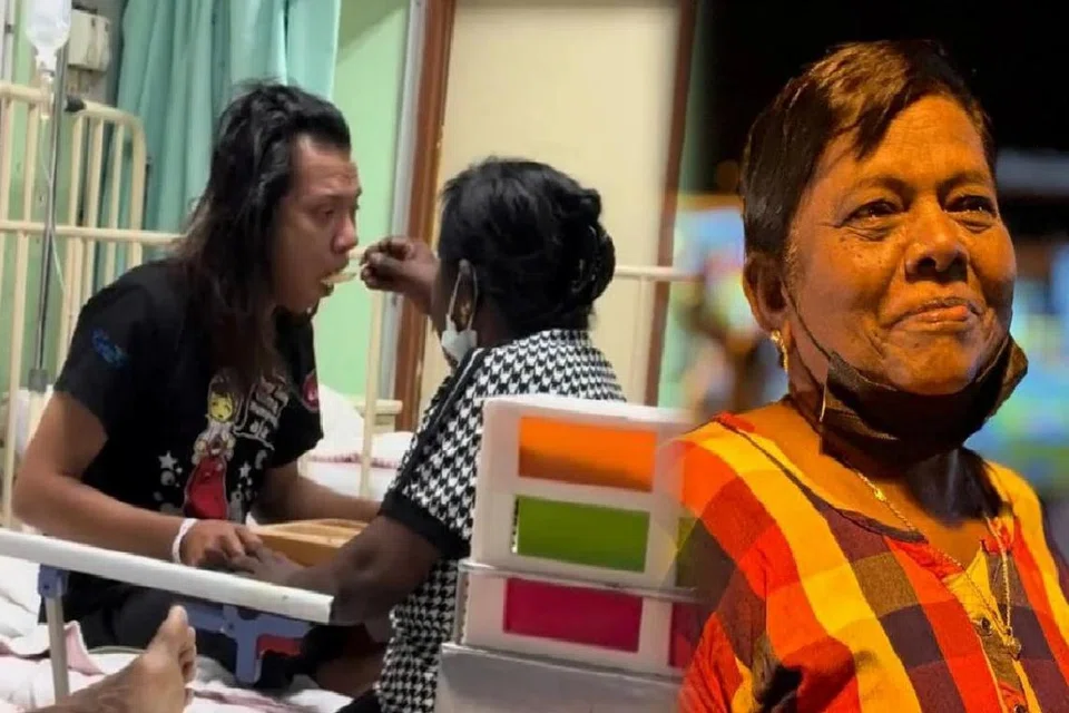 சொந்தமாகச் சாப்பிட சிரமப்பட்ட முன்பின் அறிமுகமில்லாத இளம் ஆடவருக்கு உணவு ஊட்டிய திருவாட்டி அஞ்சலா தேவி.