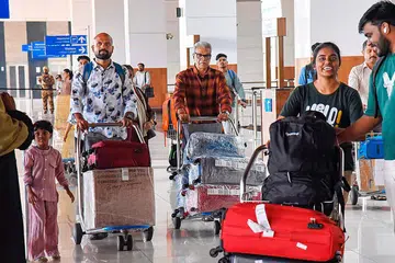 வளைகுடா நாட்டிலிருந்து கொச்சி அனைத்துலக விமான நிலையத்திற்கு வந்திறங்கிய பயணிகள்.