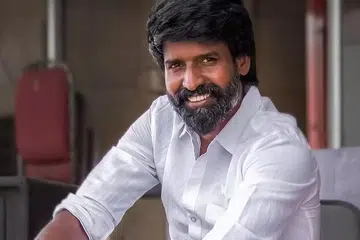 சூரி.