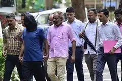 விசாரணைக்காக அழைத்துச் செல்லப்பட்ட முகம்மது சலீம்.