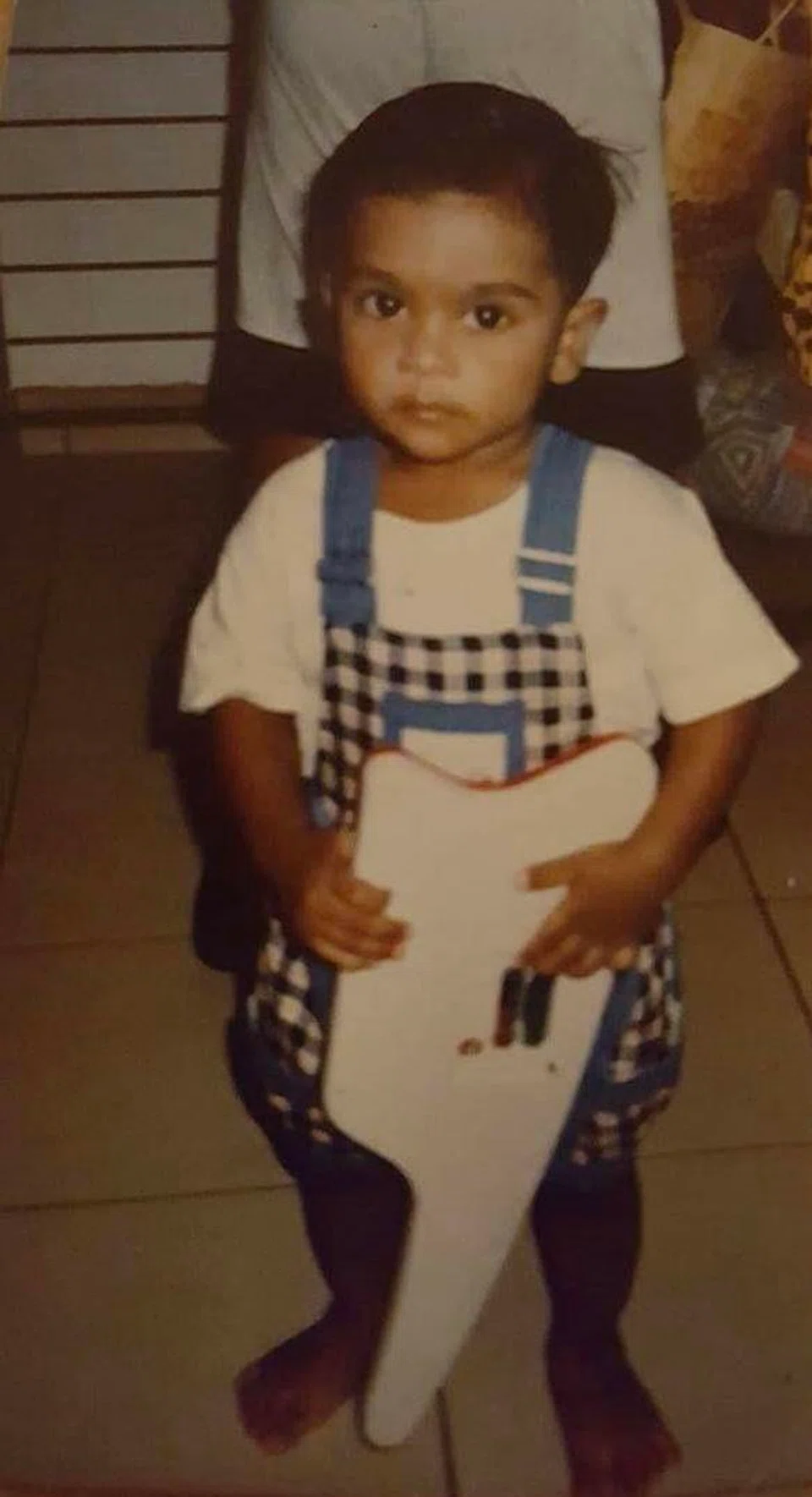 தமது இளம் வயதில் திரு டினோ ஐசக்.