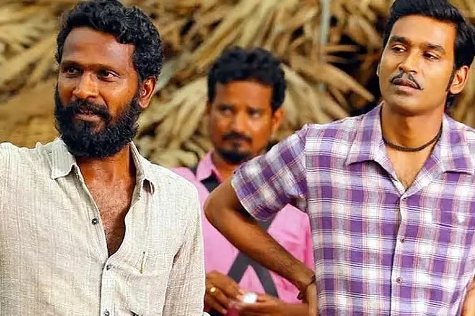 படப்பிடிப்பின்போது தனுஷ், வெற்றிமாறன்.