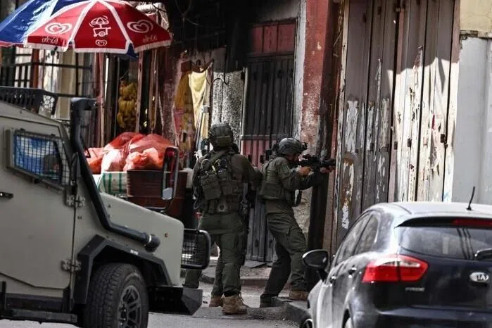 சிங்கப்பூரர்கள் இருவர் இஸ்ரேலியத் தற்காப்புப் படைக்காகச் சண்டையிட்டதை உறுதிசெய்யப் போதுமான தகவல்கள் இல்லை