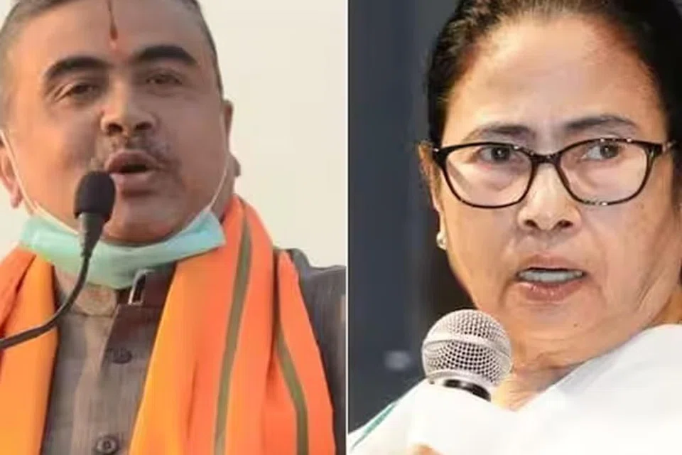 (இடமிருந்து) பாரதிய ஜனதா கட்சியின் சுவேந்து அதிகாரி, திரிணாமூல் காங்கிரசின் மம்தா பானர்ஜி.