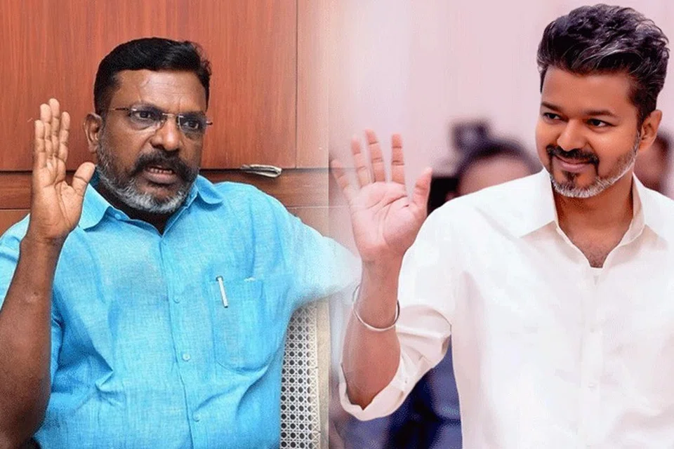 திருமாவளவன் (இடது), விஜய். 
