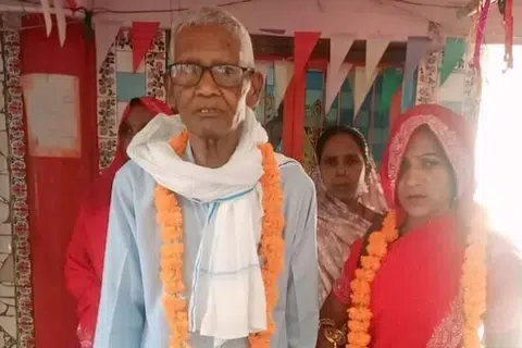 மணக்கோலத்தில் சங்குரு ராம், மன்பாவதி.