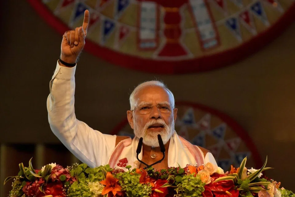 இந்தியப் பிரதமர் நரேந்திர மோடி கவுகாத்தியில் உள்ள லோக்பிரியா கோபினாத் பொர்டோலாய் பன்னாட்டு விமான நிலையத்தில் புதிய முனையத்தை டிசம்பர் 20ஆம் தேதி திறந்துவைத்து உரையாற்றியபோது எடுத்த படம்.