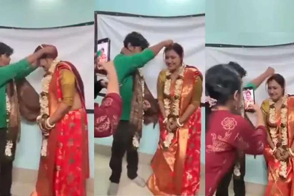 மணப்பெண் உடையணிந்து காணப்படும் பேராசிரியை, கல்லூரியில் படித்து வரும் முதலாம் ஆண்டு மாணவர் ஒருவரை இந்து முறைப்படி பல்வேறு சடங்குகளுடன் திருமணம் செய்து கொள்ளும் காணொளி இணையத்தில் பரவி வருகிறது. 