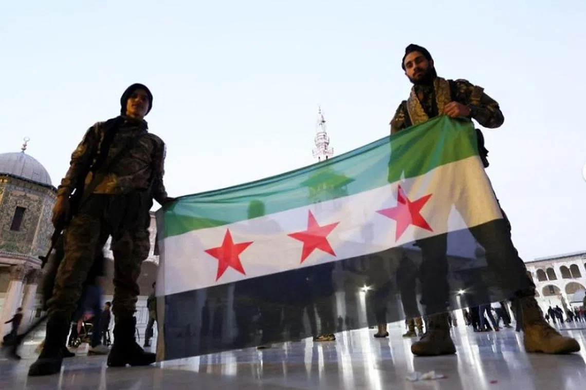 சிரியாவில் அரசாங்கம் அமைப்பதில் கிளர்ச்சிப் படையினர் தீவிரம்