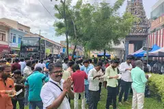 கடந்த புத்தாண்டின்போது கை முறிந்தாலும் குணமடைந்து ஆலயம் முன் கைகூப்பும் மாணிக்கம் சுரேஷ், 50,