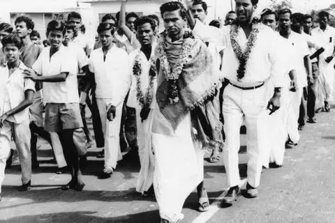 1965ஆம் ஆண்டு, பிப்ரவரி 13ஆம் தேதி வடசென்னையில் இருந்த சர் தியாகராஜா கல்லூரியில் இருந்து அண்ணாசாலை அஞ்சல் அலுவலகம் வரை இந்தியை ஆட்சி மொழியாக அறிவிப்பதை எதிர்த்து கண்டனப் பேரணி நடைபெற்றது.