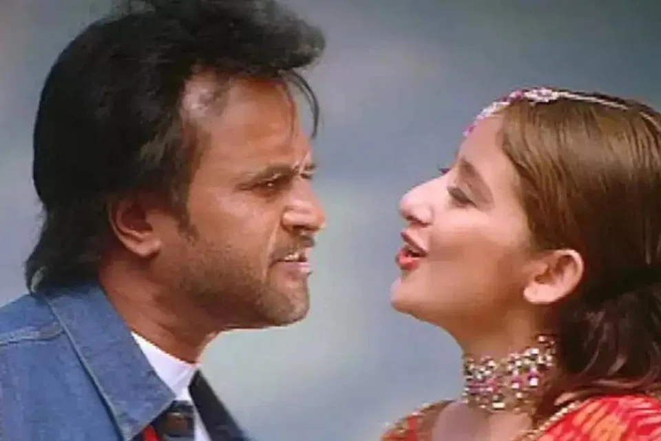 பாபா படக் காட்சியில் ரஜினிகாந்த், மனிஷா கொய்ராலா.