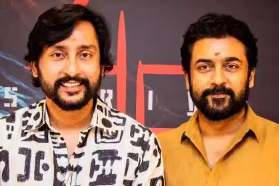 இயக்குநர் ஆர்.ஜே.பாலாஜி, நடிகர் சூர்யா.