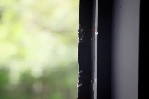 The damaged window frame in Mr Koeh Sia Yong's home.