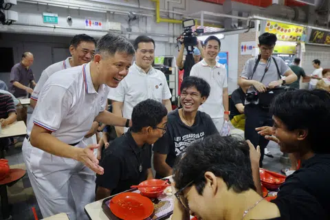 Education Minister Chan Chun Sing mingling with diners at Holland Drive Market and Food Centre on May 4.