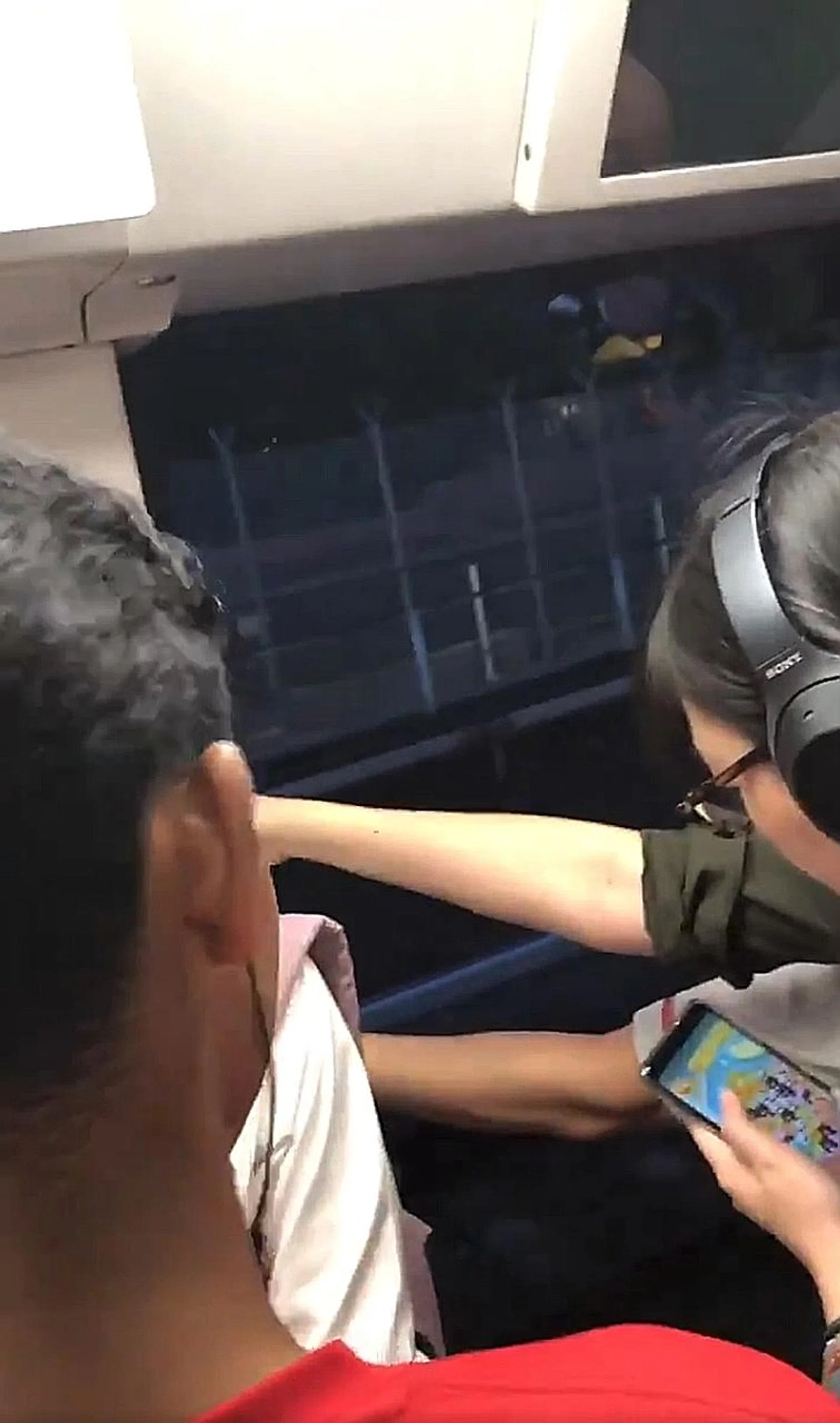 Videos on social media showed that a door on one side of a carriage was open fully as the train was moving from Ang Mo Kio station towards Yio Chu Kang station. 