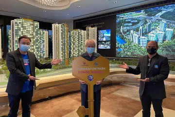 Retired hawker wins million-dollar condominium unit