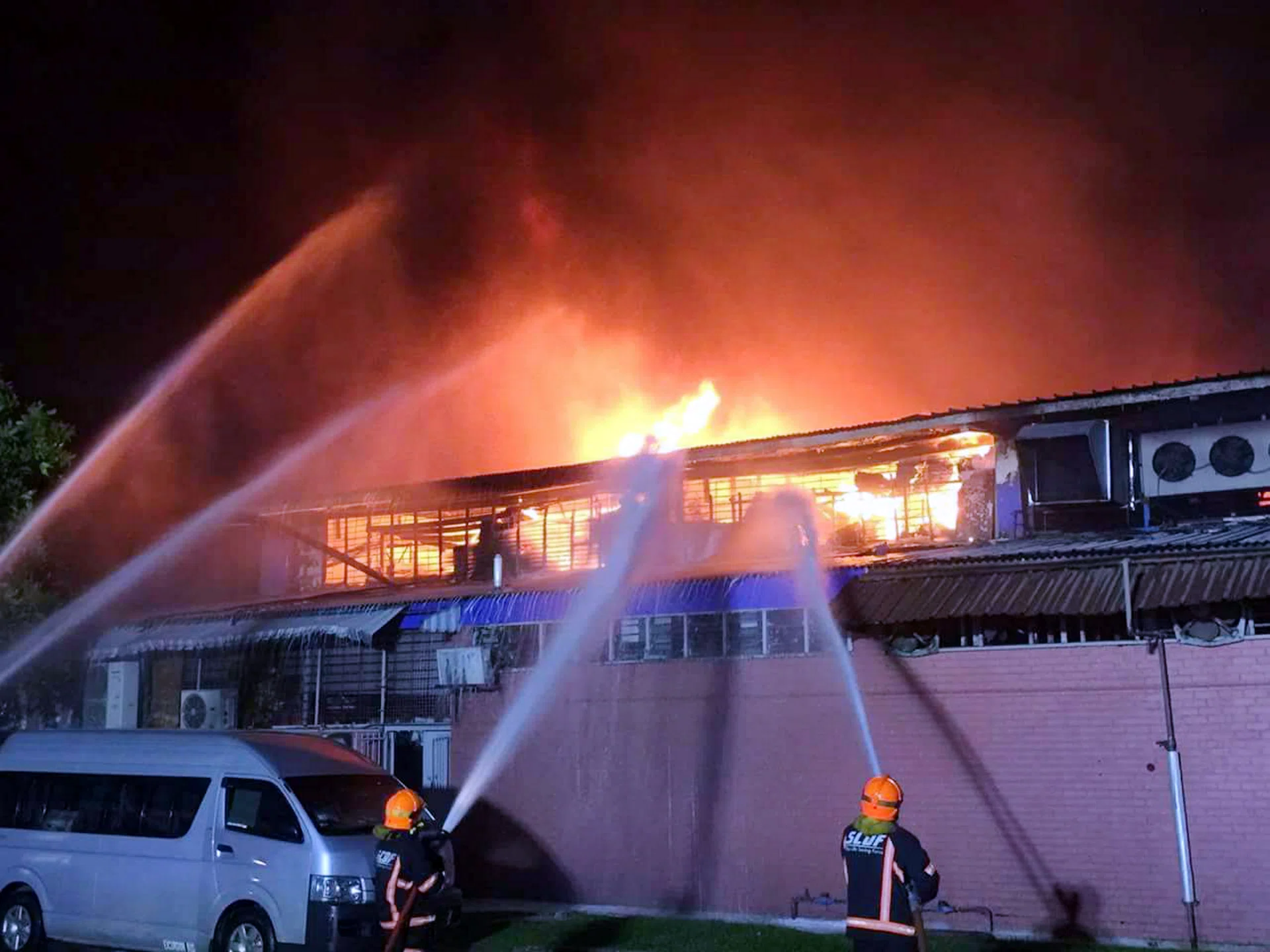 Two double-story factory units in Toa Payoh Industrial Park caught fire in the early morning of Jan 29, resulting in a massive firefighting operation involving 60 firefighters. 