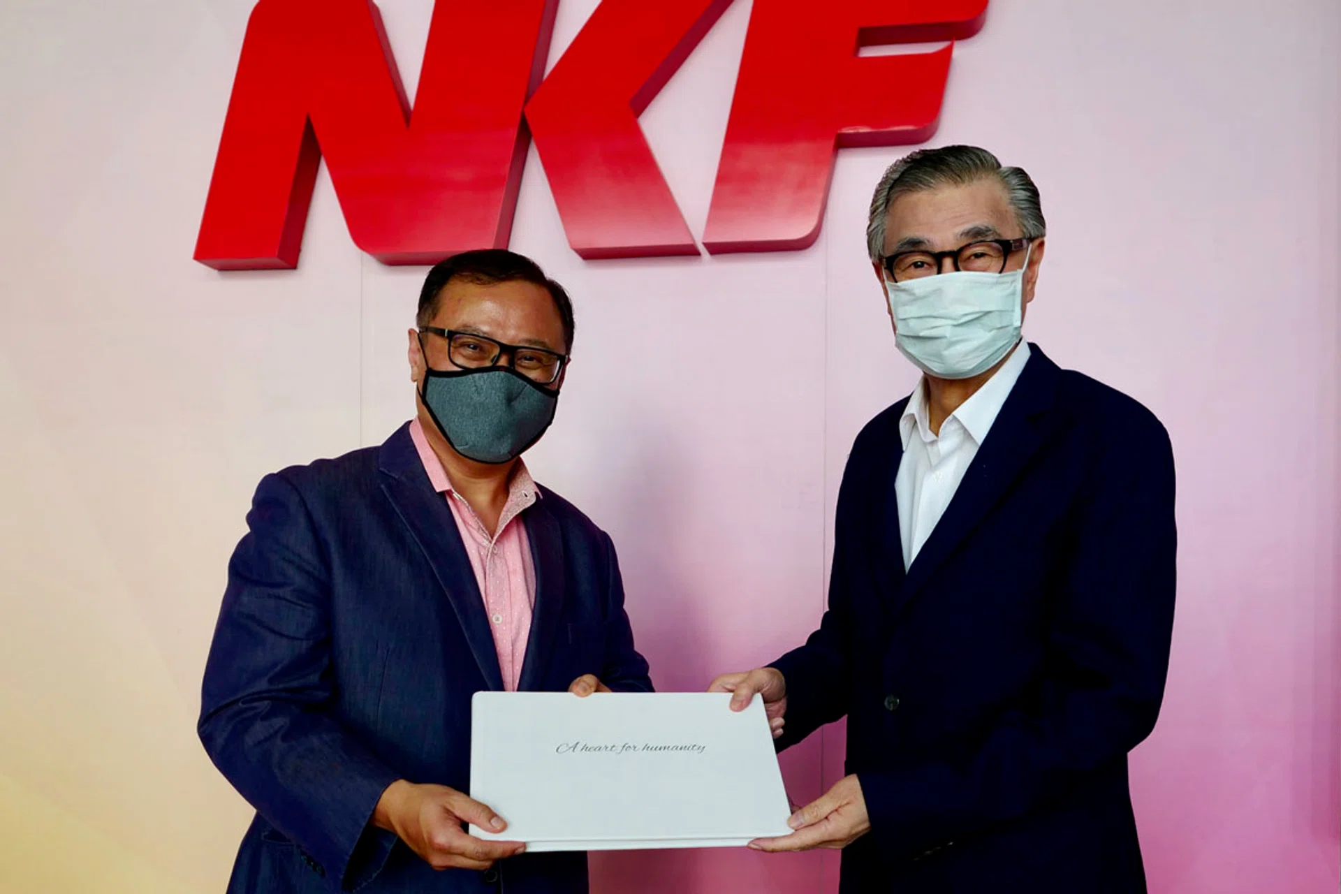 Mr Arthur Lang (far left) will take over from Mr Koh Poh Tiong (left). 