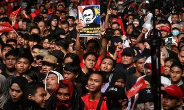 Supporters cheer as Anwar Ibrahim finally becomes Prime Minister