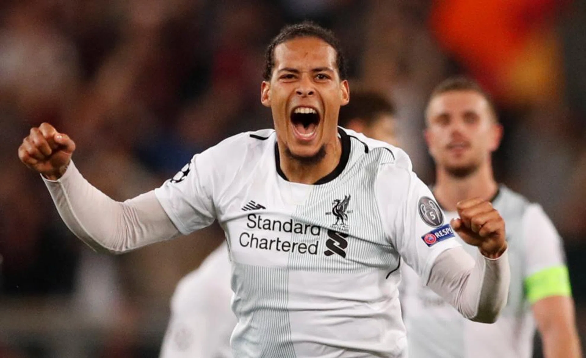 Liverpool's Virgil van Dijk celebrating after the final whistle.