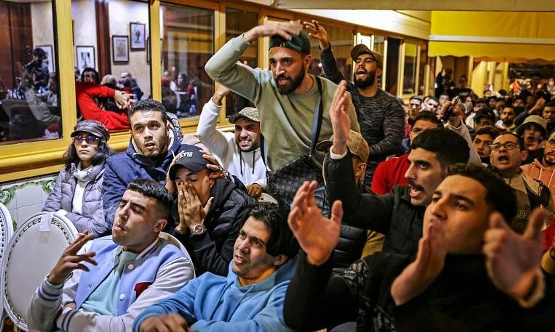Morrocan fans react during the World Cup 2022 semi-final football match against France, in the capital Rabat on Dec 14.