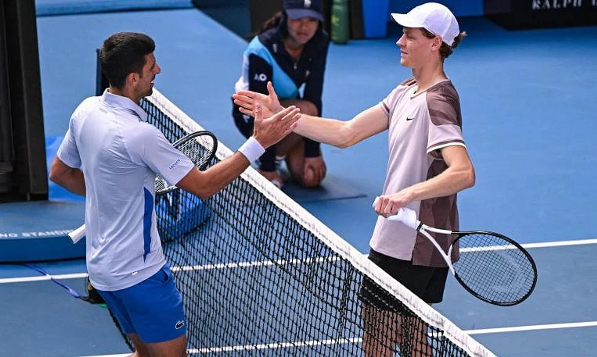 Italy's Jannik Sinner (right) greets Serbia's Novak Djokovic after victory in the men's singles semi-final match of the Australian Open tennis tournament in Melbourne on Jan 26.