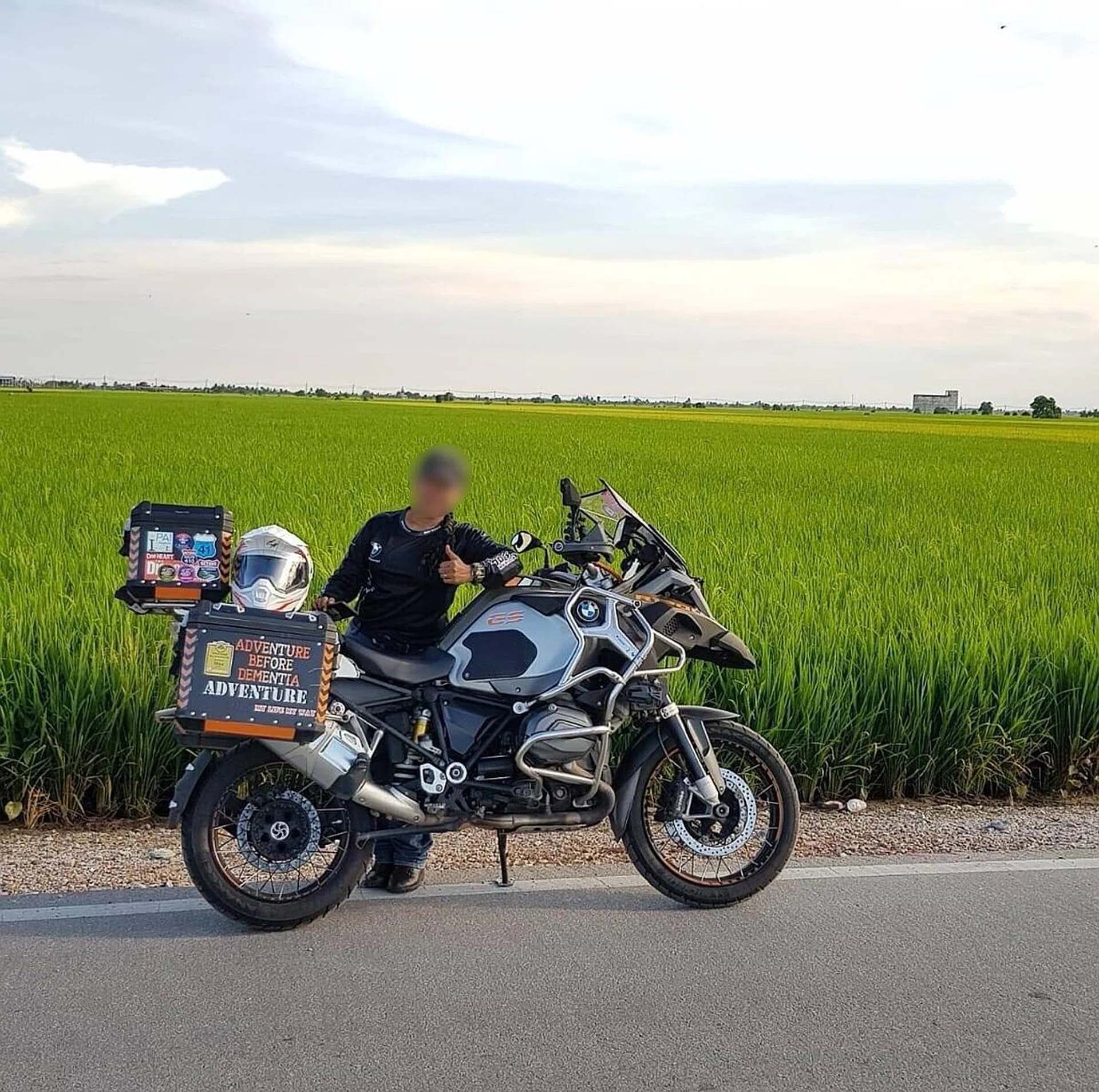 The biker with the motorcycle found outside a boutique hotel in Phnom Penh. 