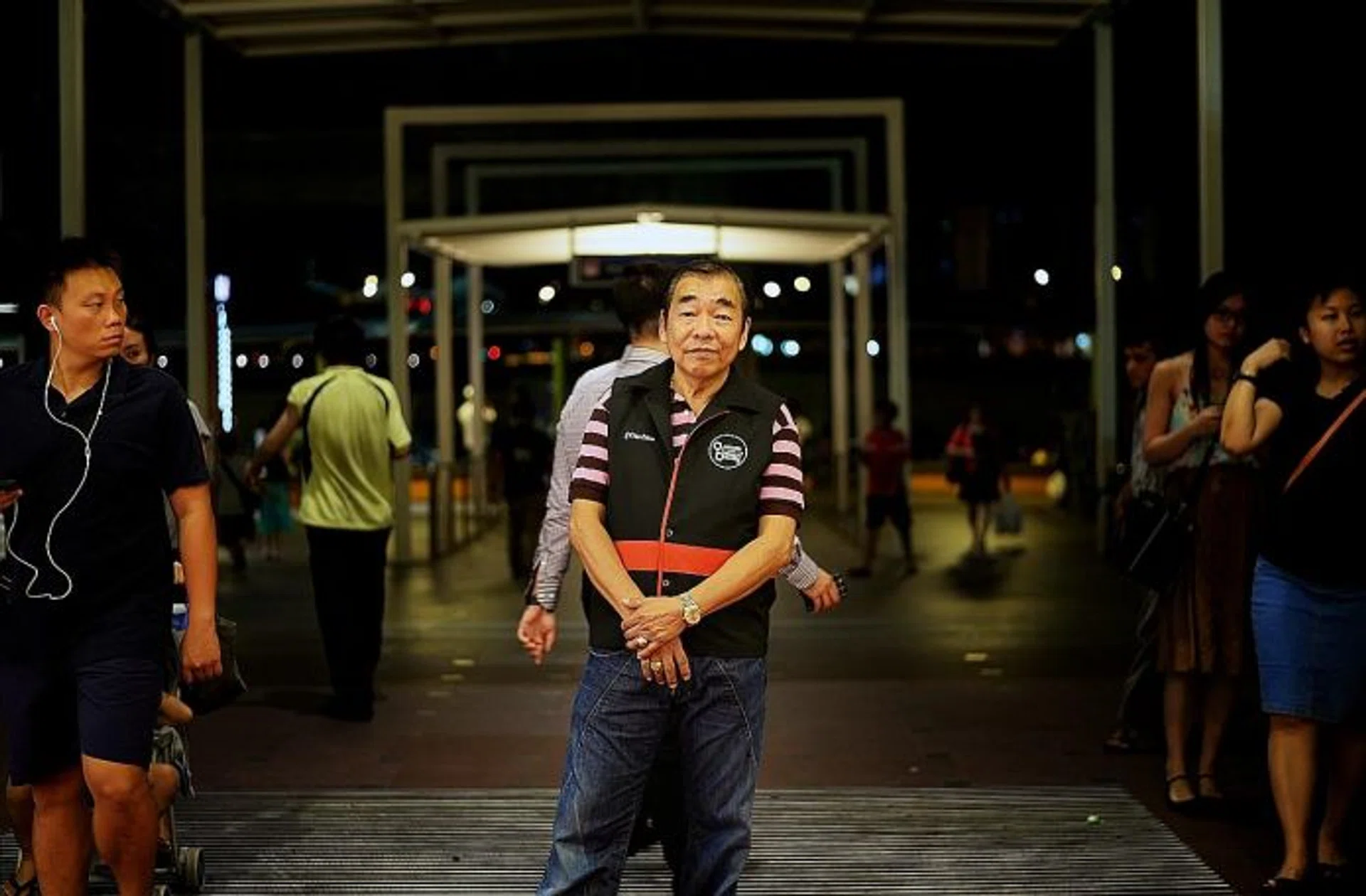 ON PATROL: Mr Andrew Yow (above) is one of NTUC FairPrice's trolley enforcement officers, and patrols around Jurong Point to ensure that no one leaves the mall with the supermarket's trolleys.