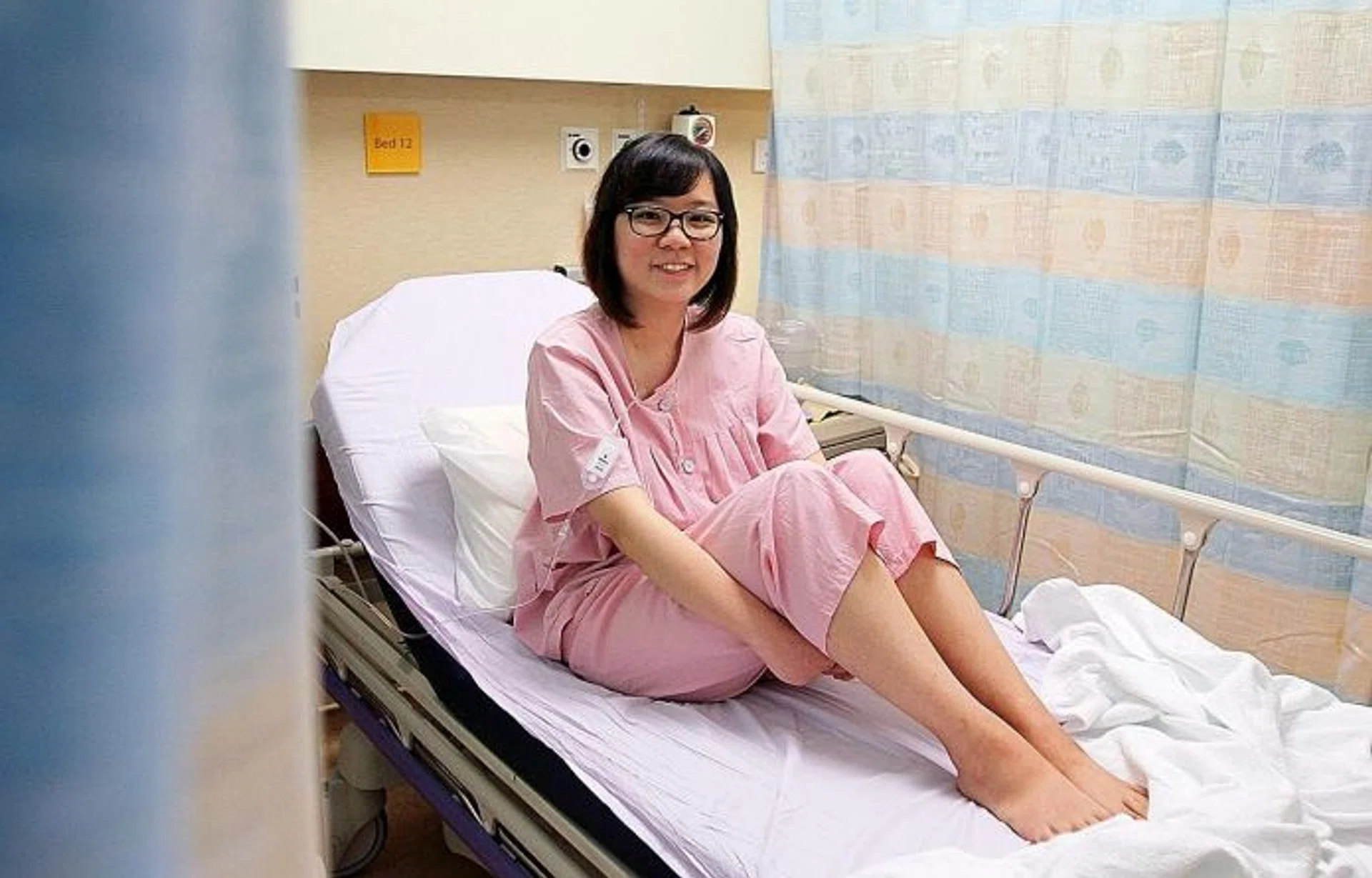 RARE: Miss Emily Ho, 23, has a rare genetic condition known as Pompe disease that results in her muscles weakening day by day, limiting her mobility.